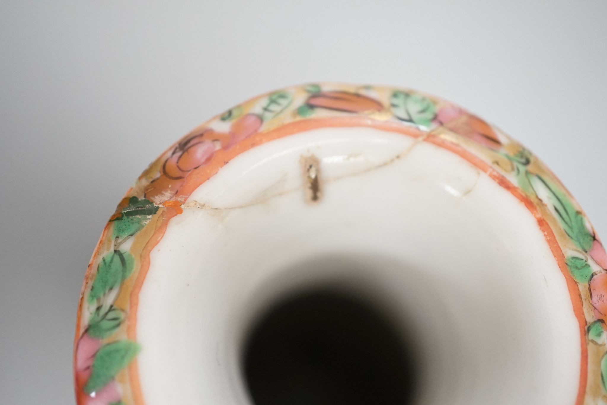 Three 19th century Chinese famille rose vases, Tallest 25 cms high.